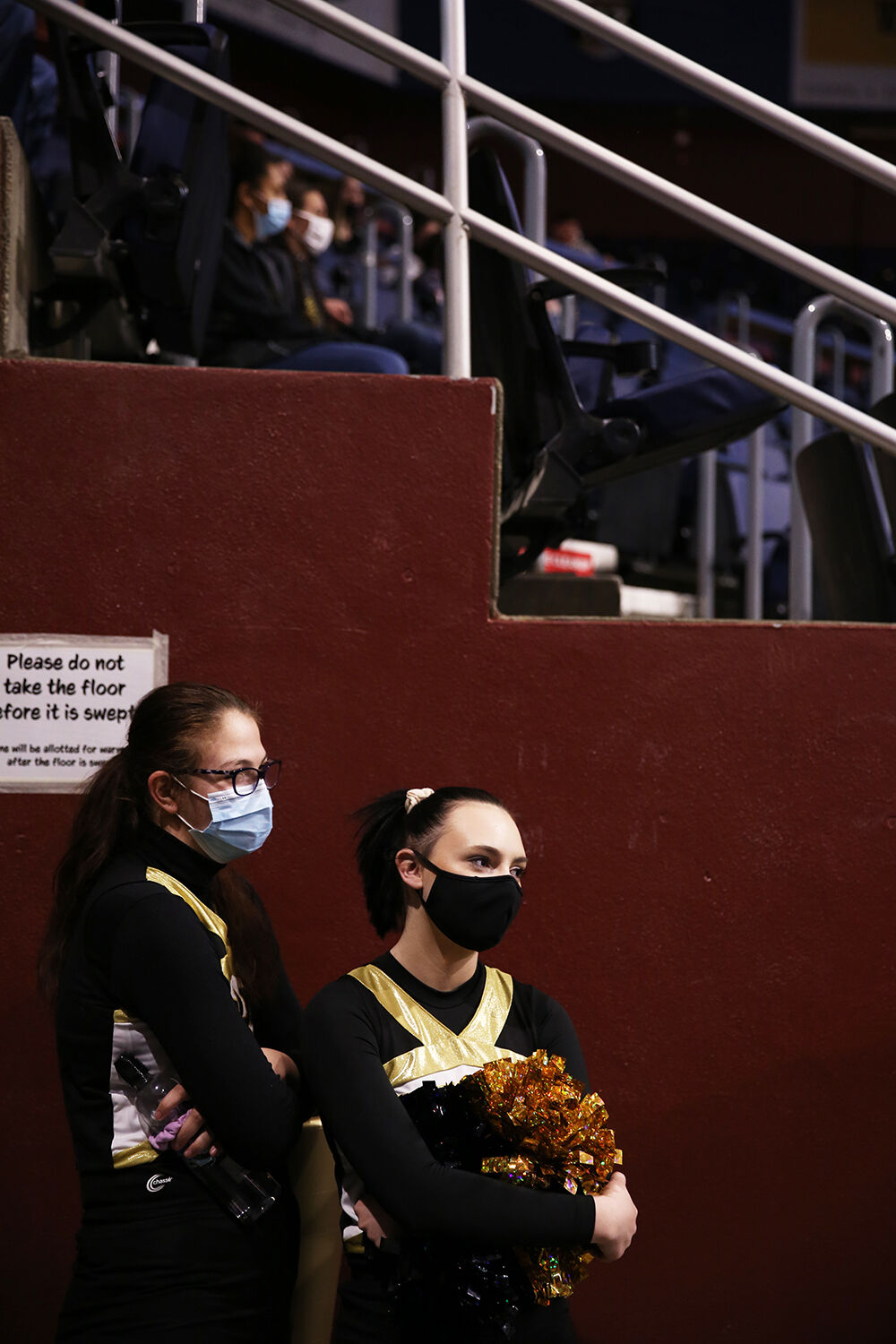 Danielle Zimmerschied, left, and Kaydence Foust wait